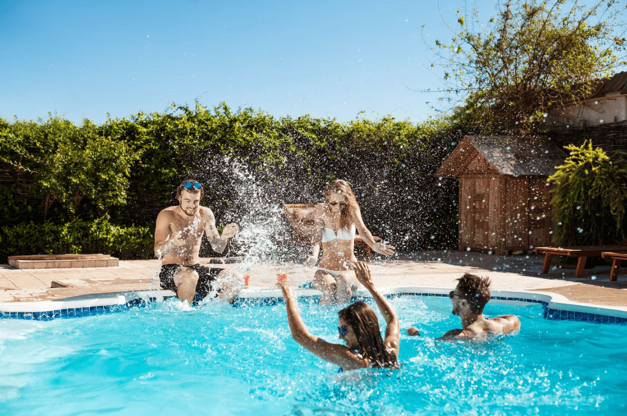 family enjoy in swimming pool