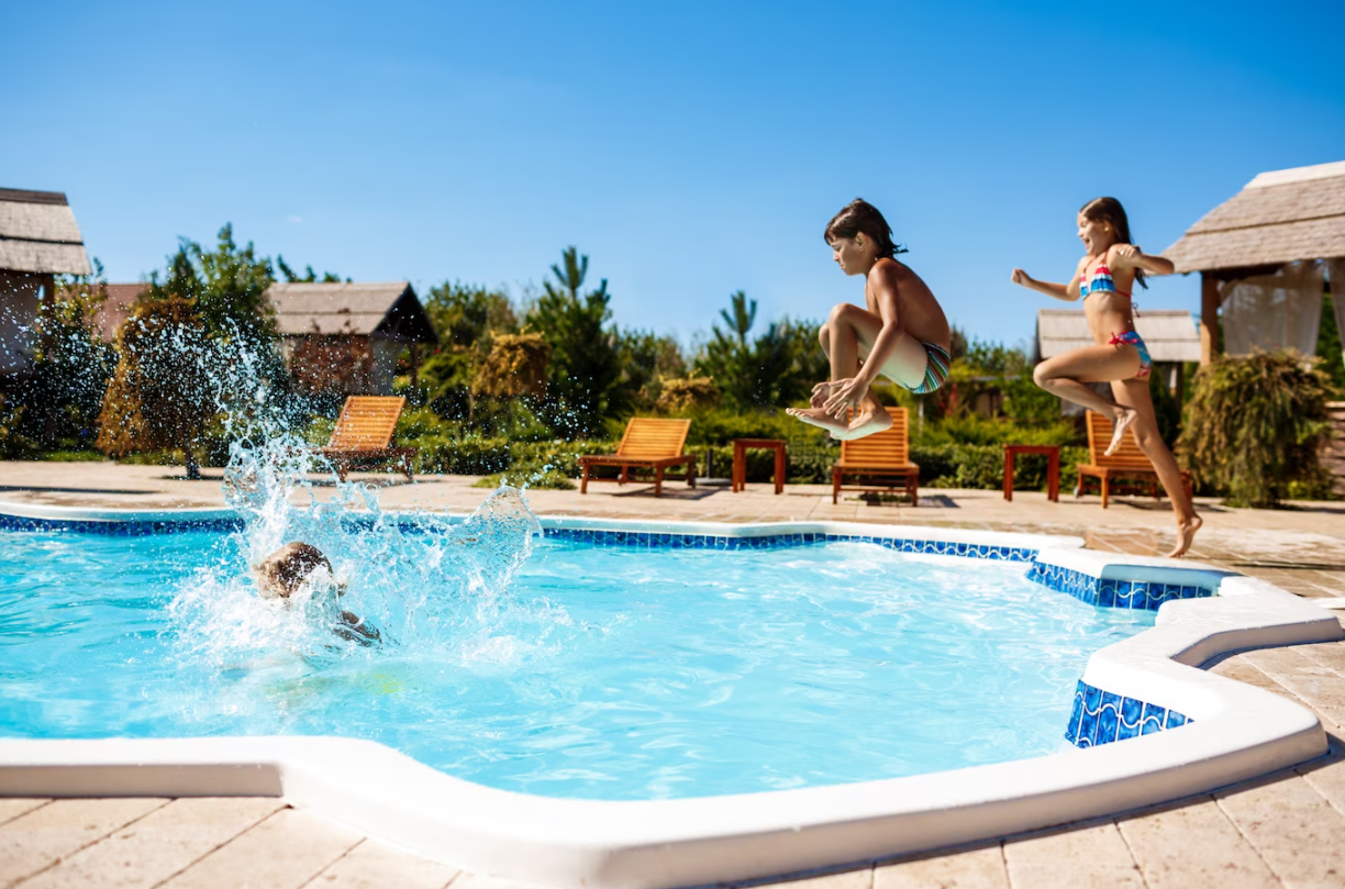 child playing in swimming pool